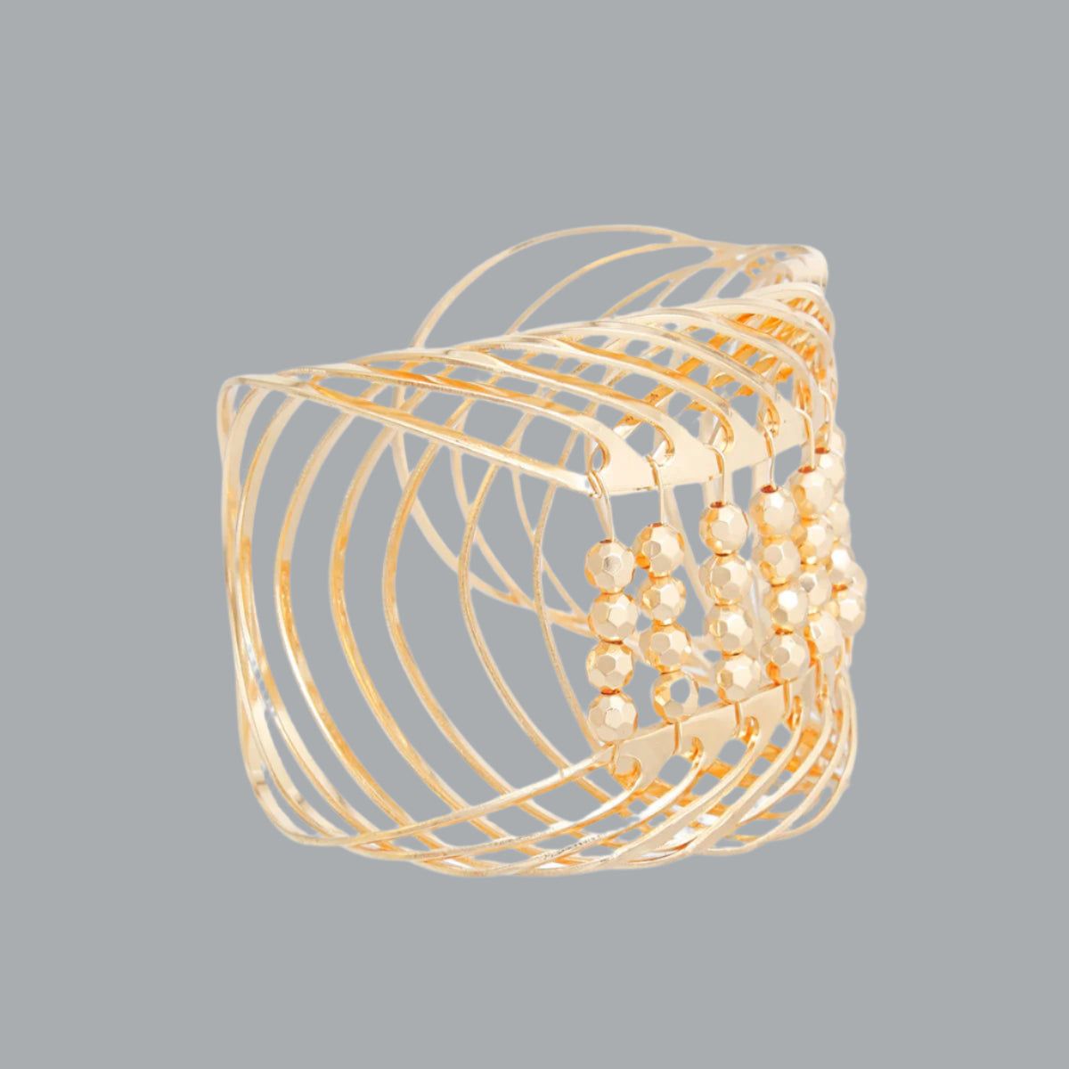 Women's Cuff Bracelet Rigid Gold Metal Rounded Design Cuff Featuring Gold Bead Detailing. Adjustable. Cuff measures 2.65" wide.
