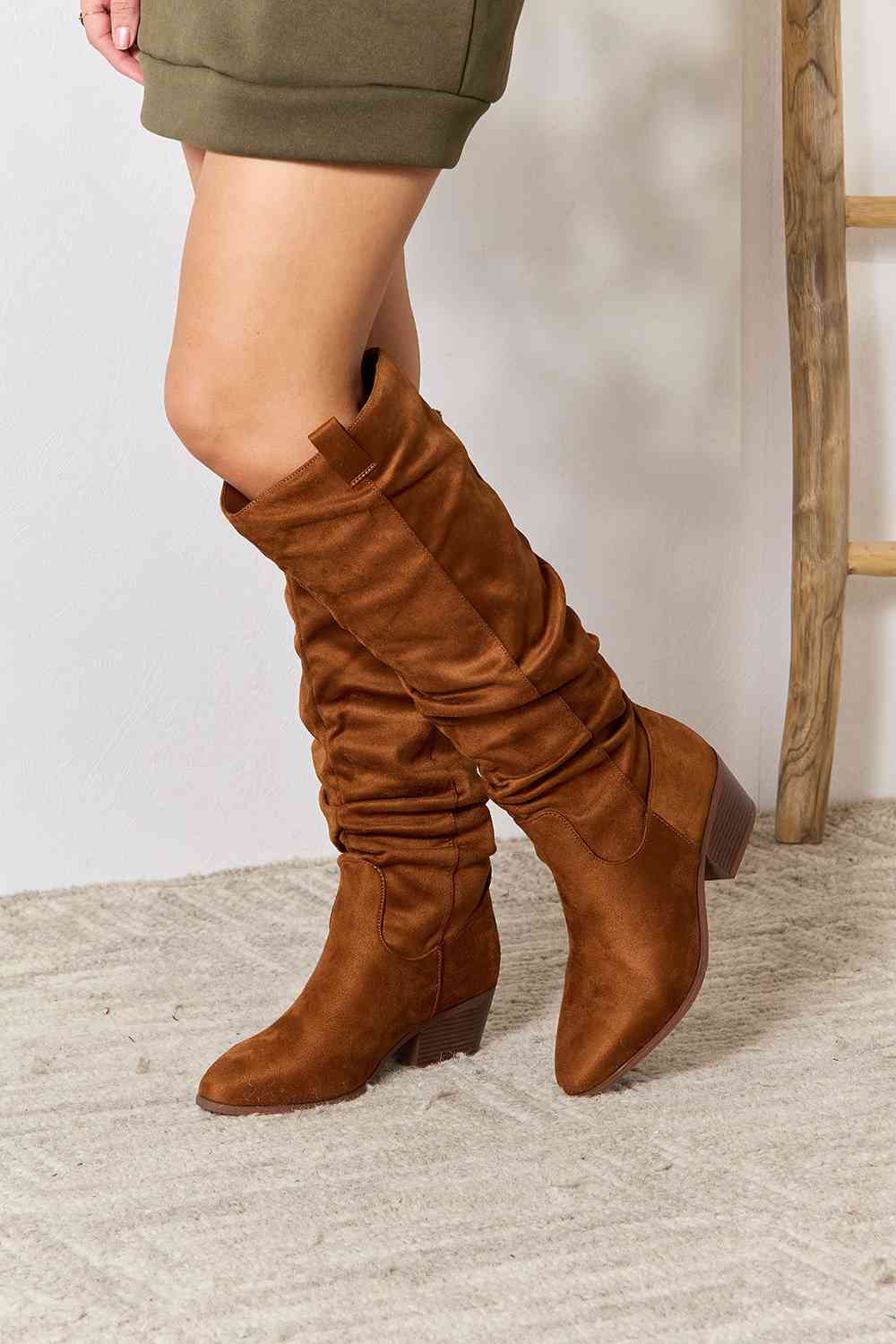 Sleek knee-high boots for women, Contemporary heeled winter boots, Versatile knee boots with high heels, Chic women's footwear with knee-high heels