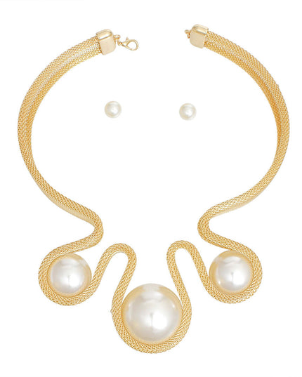 Women's Bib Necklace Set Bold Statement Rigid Chunky Gold Metal Mesh Chain Necklace Featuring Triple Teardrop Shaped Cream Pearl Bib Detail. Bib measures 3.25" x 5.5". Rigid Mesh Chain measures .85" wide. Lobster Clasp Closure. Includes Matching Pearl Ball Stud Post Backing Earrings.