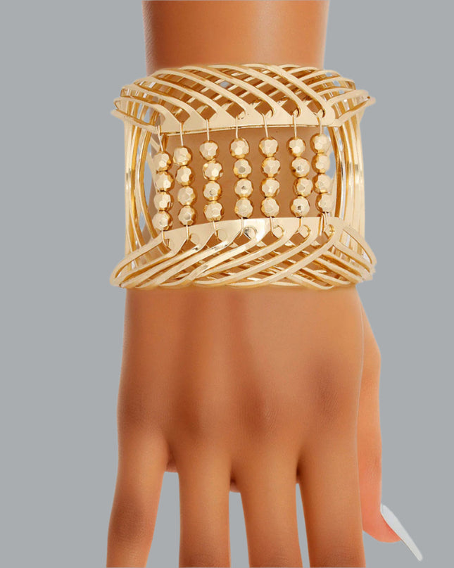 Women's Cuff Bracelet Rigid Gold Metal Rounded Design Cuff Featuring Gold Bead Detailing. Adjustable. Cuff measures 2.65" wide.