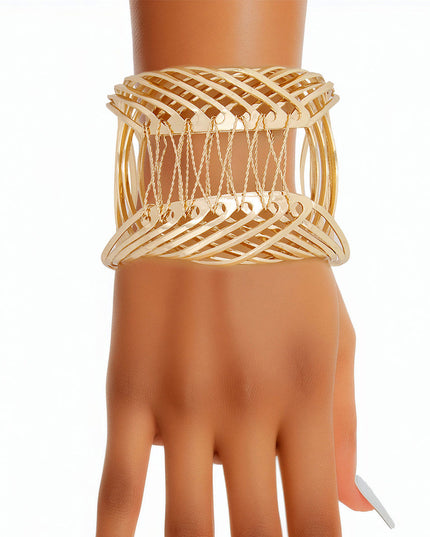 Women's Cuff Bracelet Rigid Gold Metal Rounded Design Cuff Featuring Woven Wire Detailing. Adjustable. Cuff measures 2.45" wide.