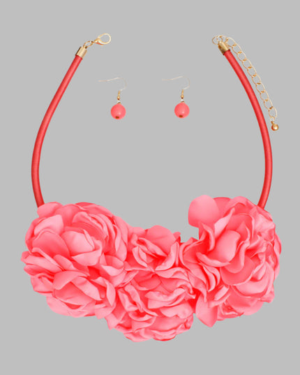 Women's Bib Necklace Dark Pink Fabric Covered Cord Rigid Collar Necklace Set Featuring Triple Pink Fabric Flower Petal Detailing. Flower Detail measures 3" x 6.5". Lobster Clasp Closure. Includes Matching Fishhook Earrings.