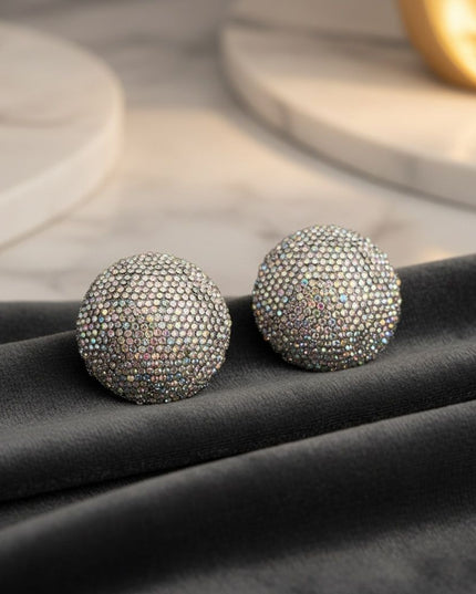 Women's Clip-On Earrings. Maximum Sparkle Statement Earrings. Bold Hollow Silver Metal Oversized Domed Clip On Earrings Encrusted with Shimmering Aurora Borealis Rhinestones.