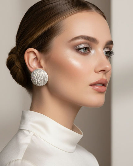 Women's Clip-On Earrings. Maximum Sparkle Statement Earrings. Bold Hollow Silver Metal Oversized Domed Clip On Earrings Encrusted with Shimmering Aurora Borealis Rhinestones.