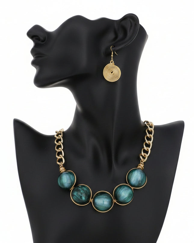 Women's Collar Necklace Set. Glossy and Galactic Chunky Gold Metal Chain Necklace with Eye-catching Centerpiece Collar Comprised of Jumbo Green Resin Ball Beads Featuring Swirled Glitter Inlay and Hand-wrapped Gold Metal Wire Detail. 