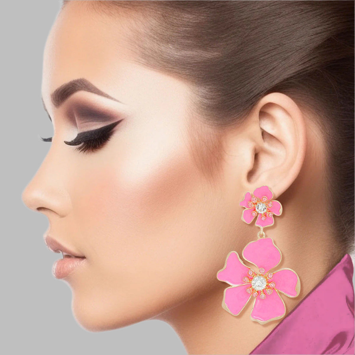 Women's Drop Earrings Gold Metal and Pink Epoxy Tropical Flower Shaped Post Backing Earrings with Matching Larger Flower Drop Detail. Earrings Feature Rhinestone Center Detailing.