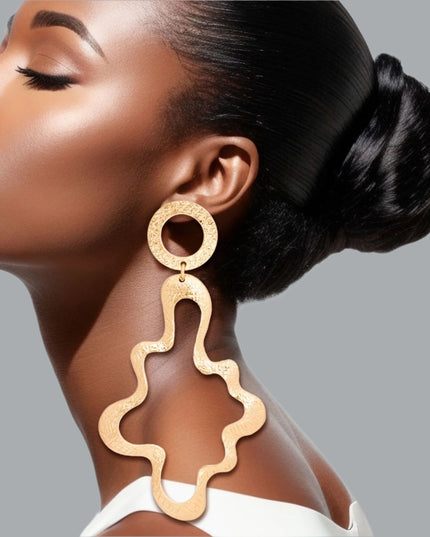 Women's Drop Earrings XLarge Gold Metal Scratched Texture Design Circle Shape Post Backing Earrings Featuring Curved Wavy Metal Statement Drop Detail.