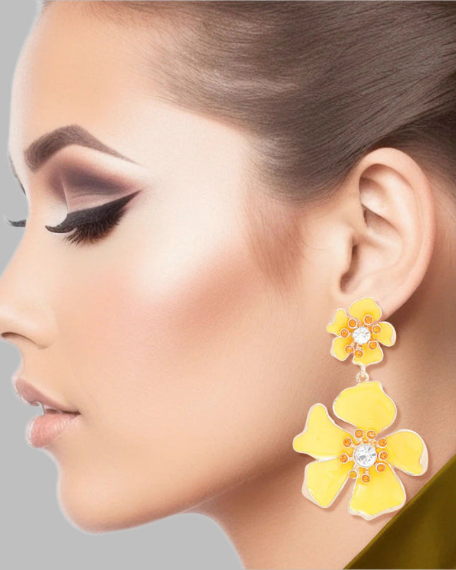 Women's Drop Earrings Gold Metal and Yellow Epoxy Tropical Flower Shaped Post Backing Earrings with Matching Larger Flower Drop Detail. Earrings Feature Rhinestone Center Detailing.