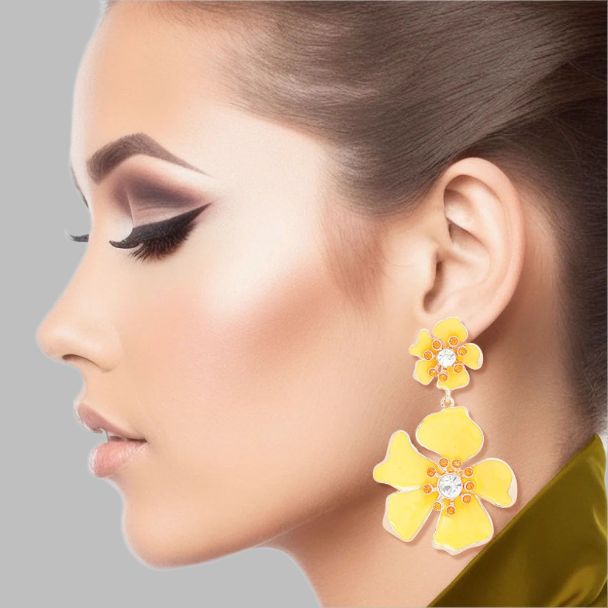 Women's Drop Earrings Gold Metal and Yellow Epoxy Tropical Flower Shaped Post Backing Earrings with Matching Larger Flower Drop Detail. Earrings Feature Rhinestone Center Detailing.