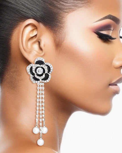 Women's Drop Earrings Silver Metal and Black Epoxy Rose Flower Earrings Featuring Rhinestone Edge Detailing and Rhinestone Fringe Drop with Pearl Ends. Post Backing.