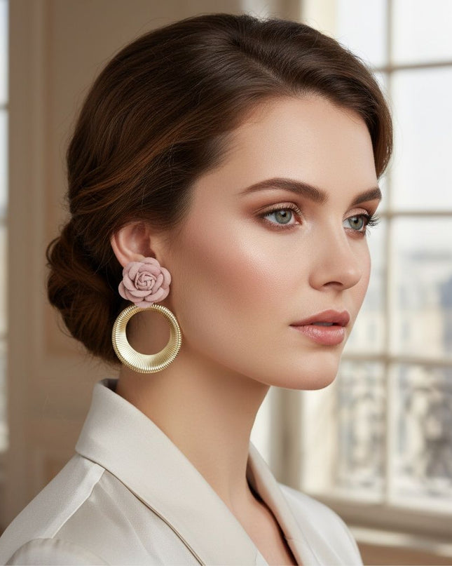 Women's Drop Earrings. Eye-Catching Drop Earrings Featuring a Sweet Pale Pink Felt Fabric Rose Flower with Dimensional Petals Paired with a Sleek Gold Metal Ribbed Texture Ring Drop Detail.