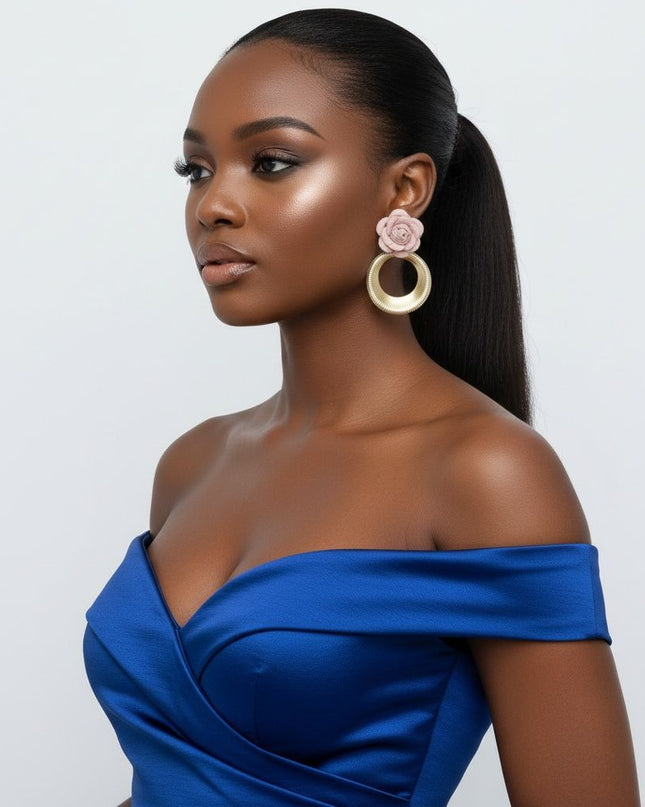 Women's Drop Earrings. Eye-Catching Drop Earrings Featuring a Sweet Pale Pink Felt Fabric Rose Flower with Dimensional Petals Paired with a Sleek Gold Metal Ribbed Texture Ring Drop Detail.