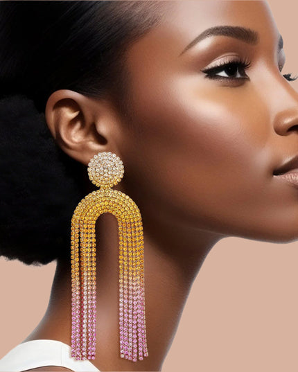 Women's Long Fringe Earrings Glam Sunset Gold Metal with Clear, Yellow, to Pink Ombre Gradient Pave Rhinestones Round Stud Earrings with Drop Arched Fringe Tassel Detail. Post Backing.