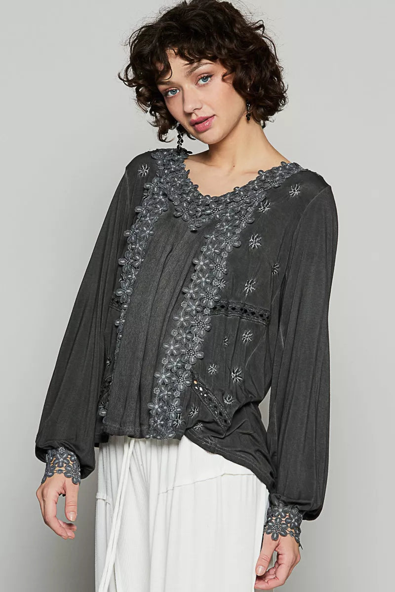 The Floral Embroidery Woven Top offers a relaxed fit and delicate floral lace trim along the low V neckline. Floral embroidery detailing on the side front adds a charming touch to the design. 