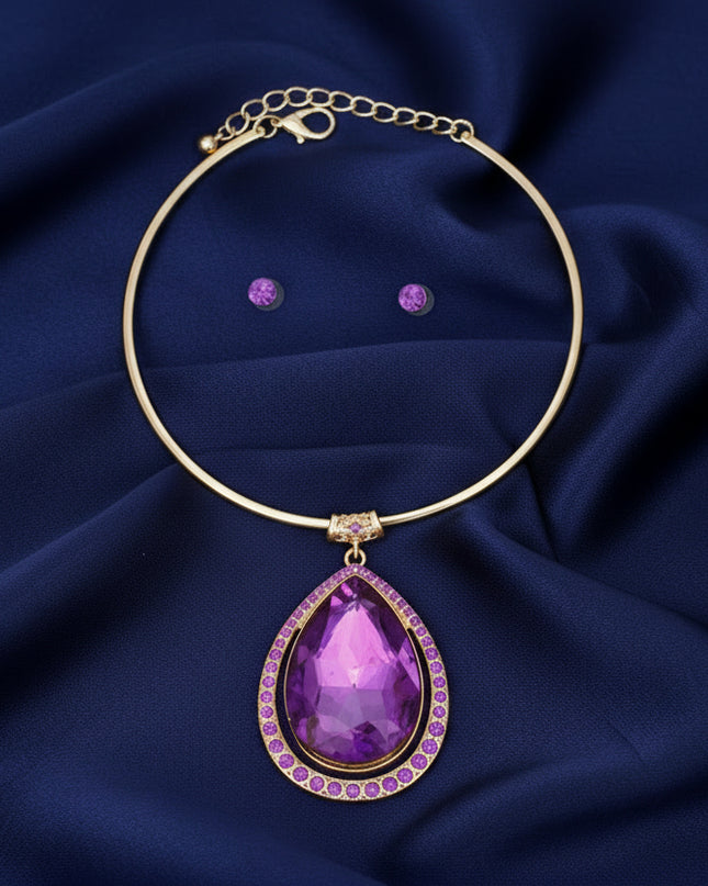 Women's Pendant Choker Necklace Set. Glamorous Evening Formal Rigid Gold Metal Choker Necklace Featuring XLarge Purple Prism Glass Crystal Teardrop Slide Pendant with Graduated Rhinestone Halo Design.