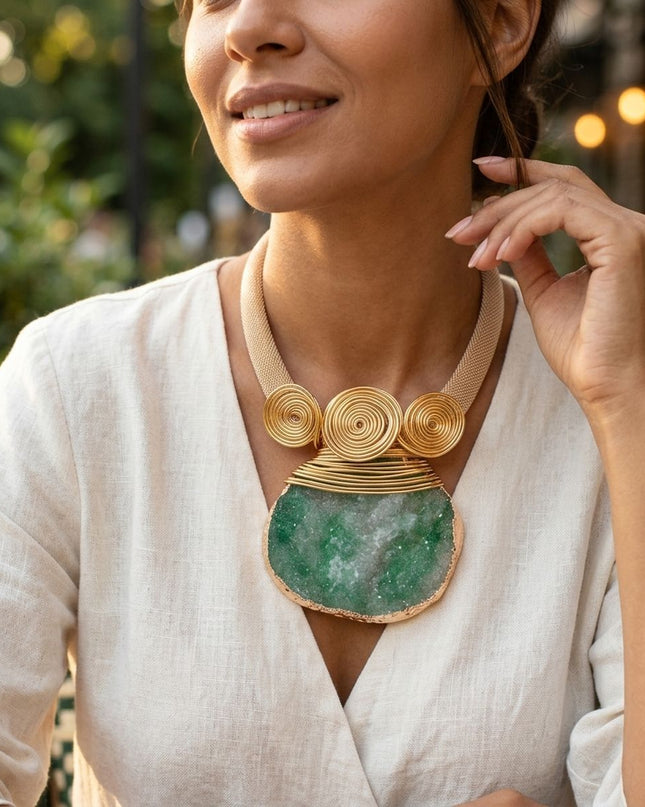 Women's Statement Collar Pendant Necklace. Tribal Gold Metal Mesh Collar Necklace Featuring a Wide Squared Mesh Chain and an Oversized Pendant Crafted with Intricately Coiled Gold Metal Wire. 
