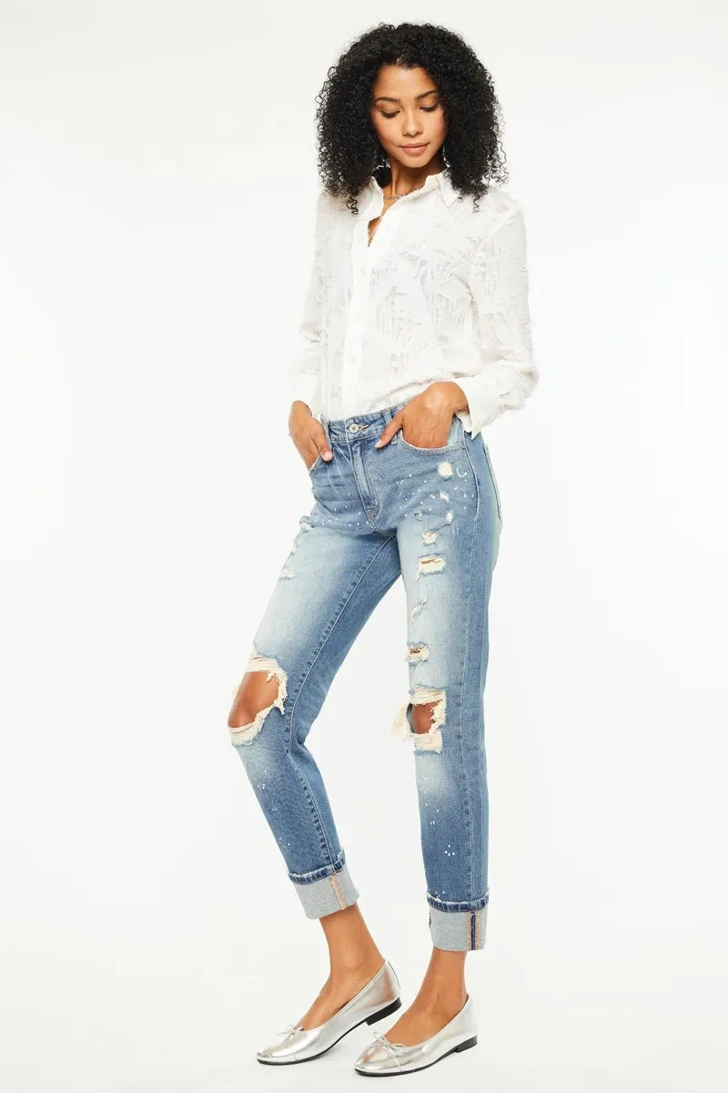 The edgy distressed details add a touch of cool and casual vibe to the classic boyfriend jeans style. 