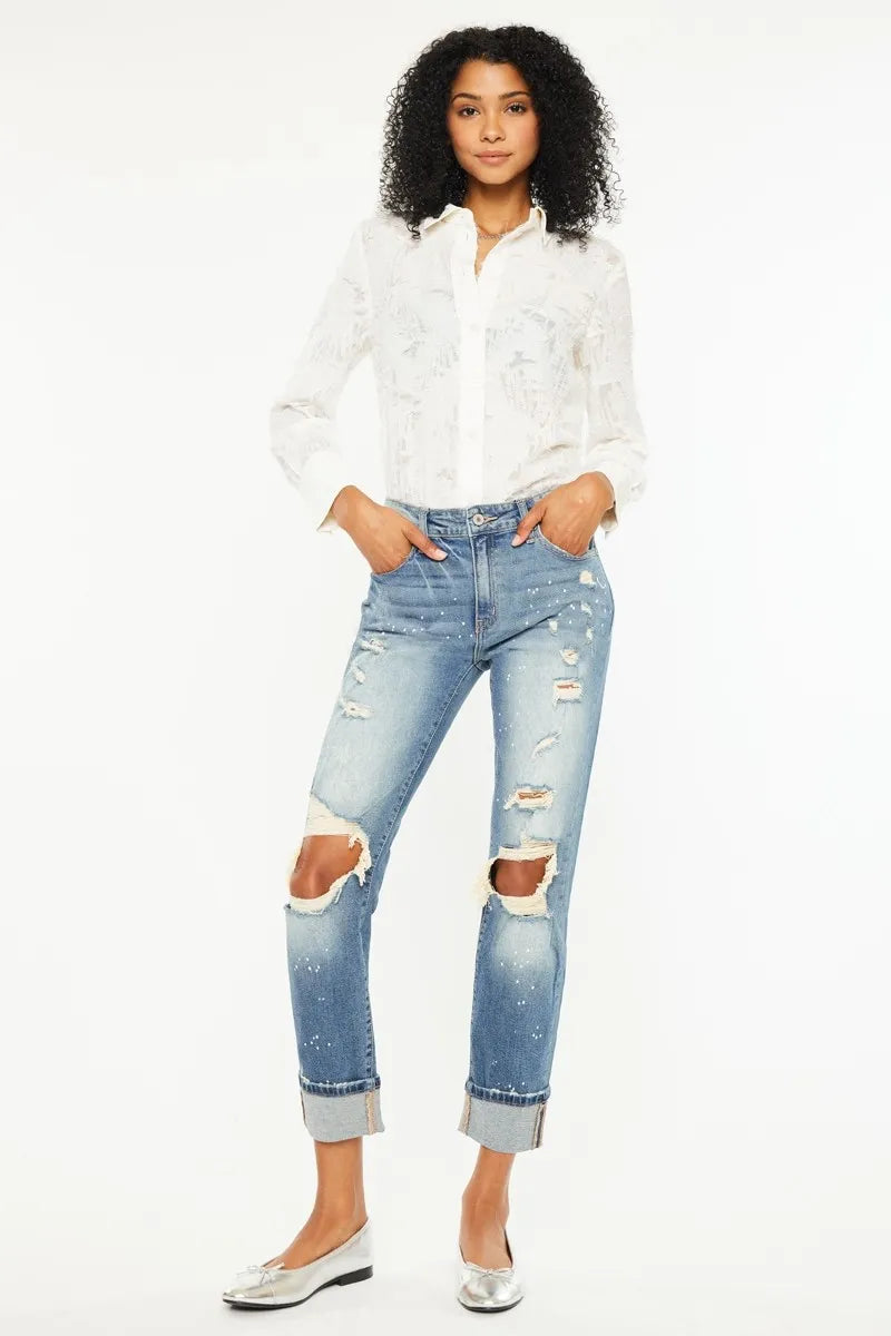 The edgy distressed details add a touch of cool and casual vibe to the classic boyfriend jeans style. 