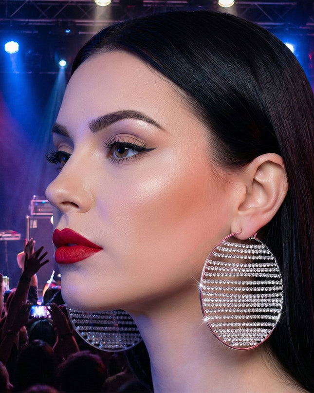 Women's Hoop Earrings. Dazzling Red-Carpet Ready Silver Metal Hoop Earrings Featuring Linear Vertical Rows of Clear Rhinestones. Omega Hoop Closure.
