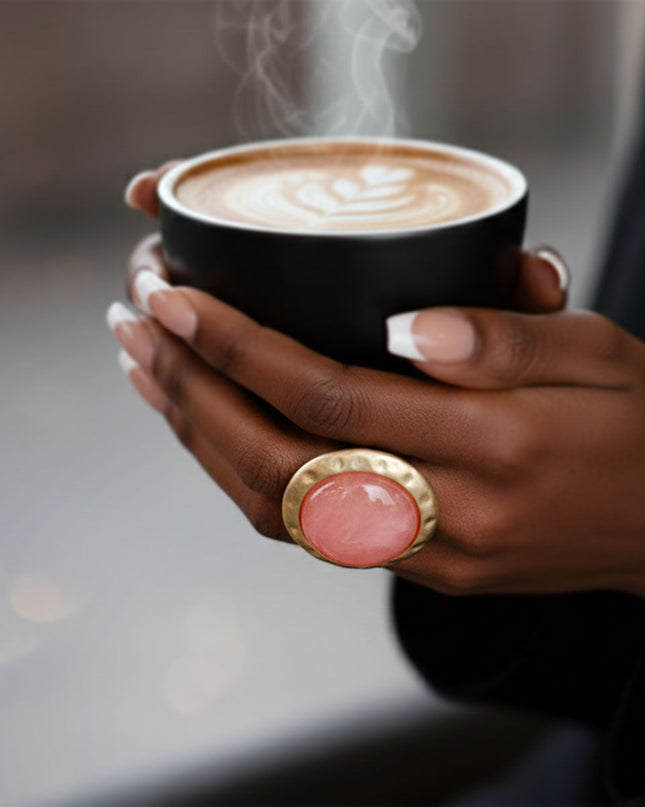Women's Cocktail Ring. Style Statement Large Domed Round Marbled Pink Resin Cocktail Ring with Matte Gold Hammered Metal Edge. Stretch Metal Band.