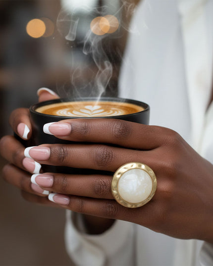 Women's Cocktail Ring. Style Statement Large Domed Round Marbled White Resin Cocktail Ring with Matte Gold Hammered Metal Edge. 