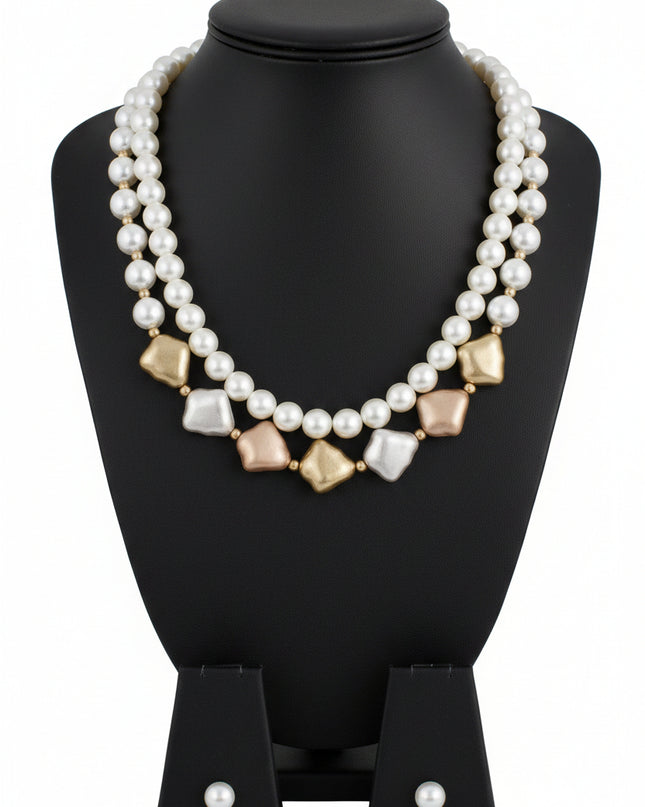 Women's Layered Vintage Pearl Necklace Set. Feminine and Elegant Vintage Inspired Faux Pearl Double Strand Layered Necklace Featuring Chunky Cream Acrylic Pearls and Matte Gold, Matte Silver, and Matte Rose Gold Acrylic Faux Natural Pearl Detailing. 