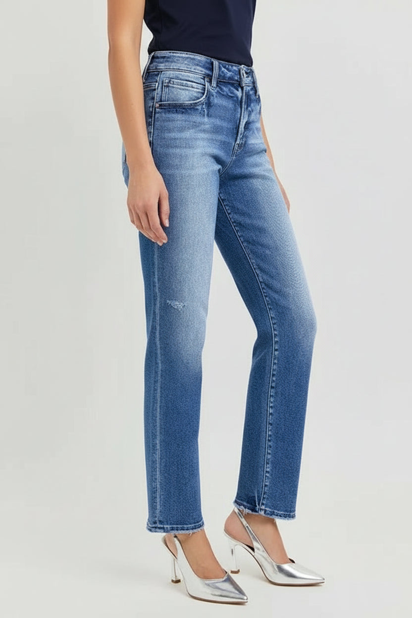 The Mid Rise Ankle Tapered Jeans are a classic and versatile denim option for a stylish and comfortable look. The mid-rise waist offers a flattering fit that sits comfortably at the natural waistline. 