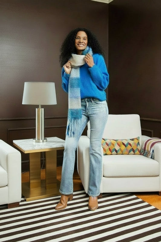 These Mid-Size Thermal Bootcut Jeans seamlessly blend style and warmth for a practical yet trendy look. Crafted from a thermal fabric, they provide both comfort and insulation during cooler seasons. 