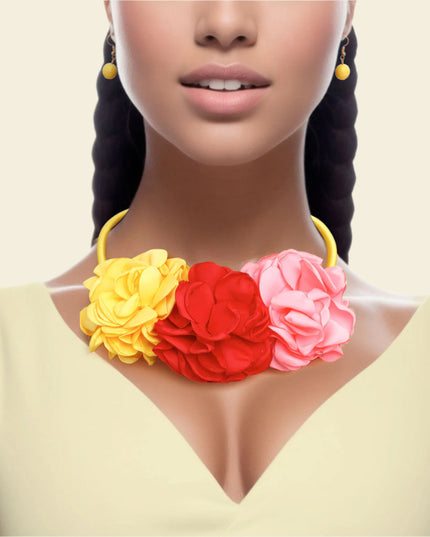 Women's Bib Necklace Yellow Fabric Covered Cord Rigid Collar Necklace Set Featuring Triple Pink, Red, and Yellow Fabric Flower Petal Detailing. Flower Detail measures 3" x 6.5". Lobster Clasp Closure. Includes Matching Fishhook Earrings.