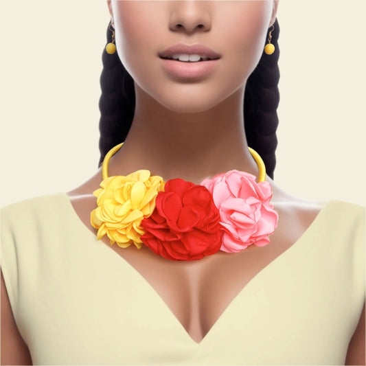 Women's Bib Necklace Yellow Fabric Covered Cord Rigid Collar Necklace Set Featuring Triple Pink, Red, and Yellow Fabric Flower Petal Detailing. Flower Detail measures 3" x 6.5". Lobster Clasp Closure. Includes Matching Fishhook Earrings.