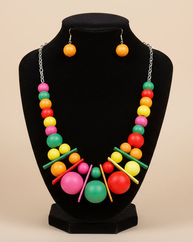 Women's Bib Necklace Set. Tribal Global Artisan Bib Necklace Set with Chunky Eye-Catching Light Multicolor Wooden Ball Bead Neckline and Featuring Bib Comprised of Double Layer Jumbo Wood Ball Beads and Wood Rectangle Pieces.