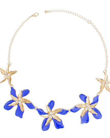 Women's Collar Necklace Gold Metal Round Link Chain Featuring Textured Gold Metal and Blue Epoxy Tropical Iris Flowers with Rhinestone Centers. Flowers measure 2.15" each. Lobster Clasp Closure.