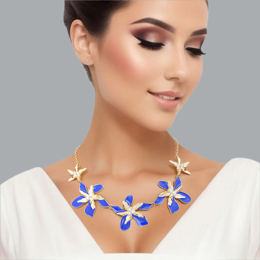 Women's Collar Necklace Gold Metal Round Link Chain Featuring Textured Gold Metal and Blue Epoxy Tropical Iris Flowers with Rhinestone Centers. Flowers measure 2.15" each. Lobster Clasp Closure.
