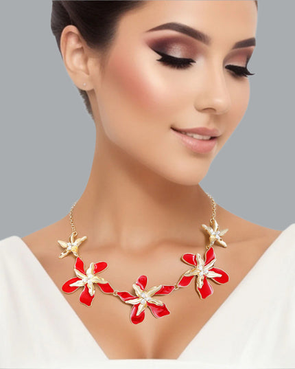 Women's Collar Necklace Gold Metal Round Link Chain Featuring Textured Gold Metal and Red Epoxy Tropical Iris Flowers with Rhinestone Centers. Flowers measure 2.15" each. Lobster Clasp Closure.