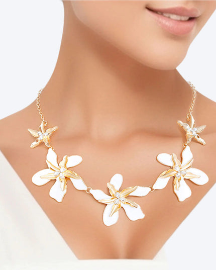 Women's Collar Necklace Gold Metal Round Link Chain Featuring Textured Gold Metal and White Epoxy Tropical Iris Flowers with Rhinestone Centers. Flowers measure 2.15" each. Lobster Clasp Closure.