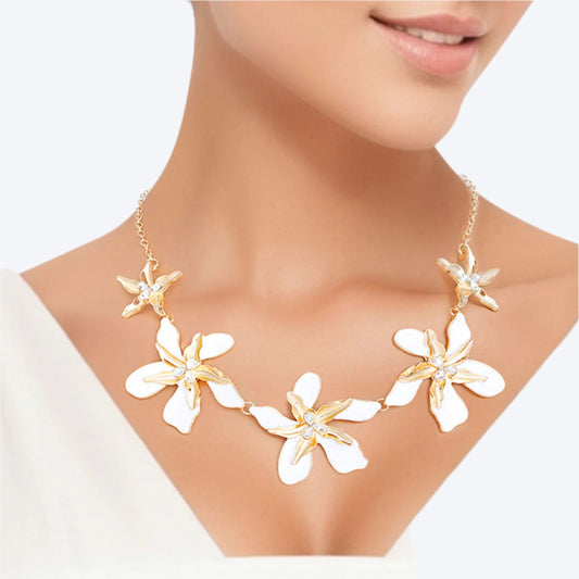 Women's Collar Necklace Gold Metal Round Link Chain Featuring Textured Gold Metal and White Epoxy Tropical Iris Flowers with Rhinestone Centers. Flowers measure 2.15" each. Lobster Clasp Closure.