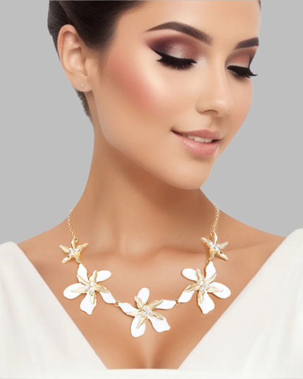 Women's Collar Necklace Gold Metal Round Link Chain Featuring Textured Gold Metal and White Epoxy Tropical Iris Flowers with Rhinestone Centers. Flowers measure 2.15" each. Lobster Clasp Closure.
