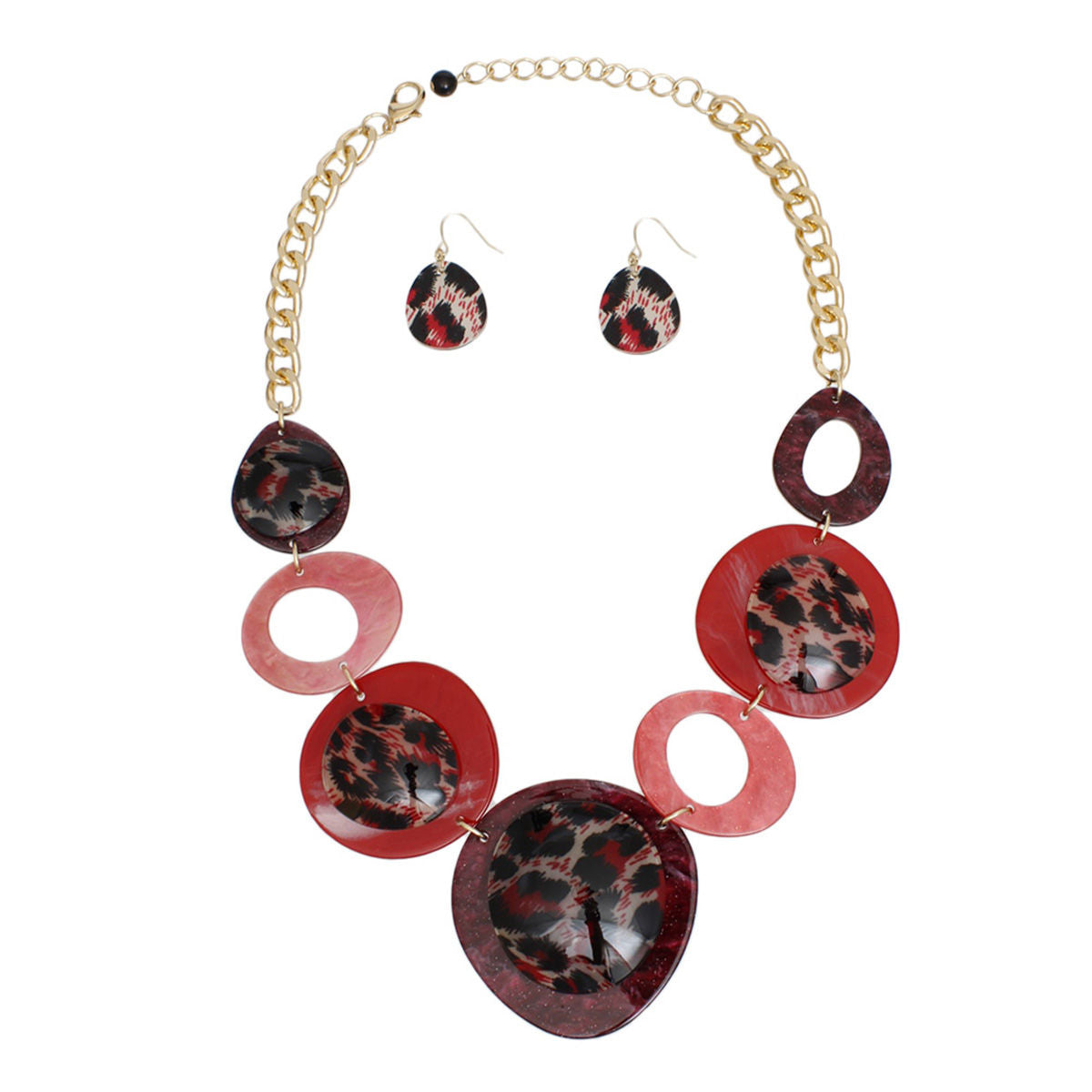 Women's Link Necklace Set Trending Marbled Shades of Red Acrylic with Glitter Linked Collar Design Featuring Rounded Leopard Print Acrylic Discs Details. Center Disc measures 2.75". Gold Metal Chain Lobster Clasp Closure. Includes Matching Fishhook Earrings.