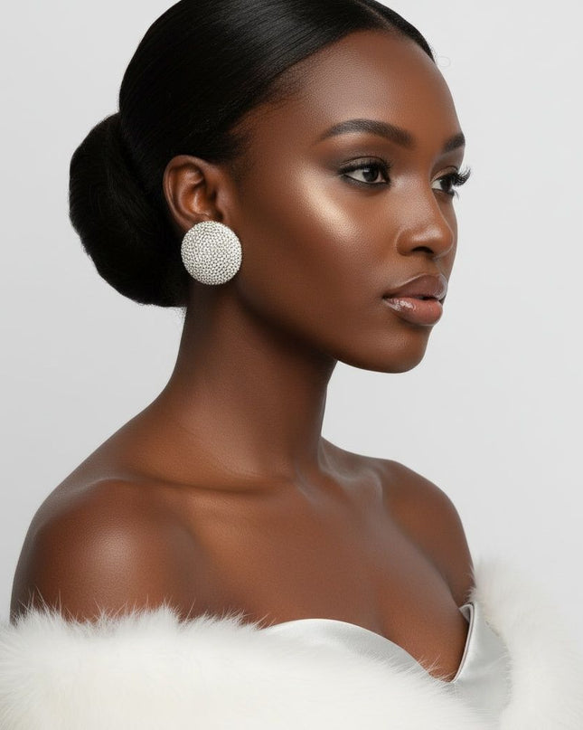 Women's Clip On Earrings. Maximum Sparkle Statement Earrings. Bold Hollow Gold Metal Oversized Domed Clip On Earrings Encrusted with Shimmering Clear Rhinestones.