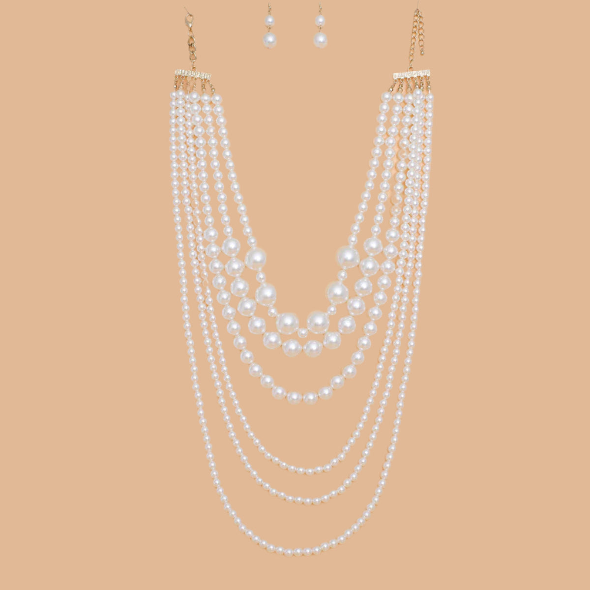Women's Pearl Necklace Set 6 Strand Acrylic Cream Pearl Long Layered Necklace Featuring Bubblegum Pearl Center Details. Necklace Layers Measure 20" to 36". Gold Metal Lobster Clasp Closure. Includes Matching Fishhook Double Drop Pearl Earrings.