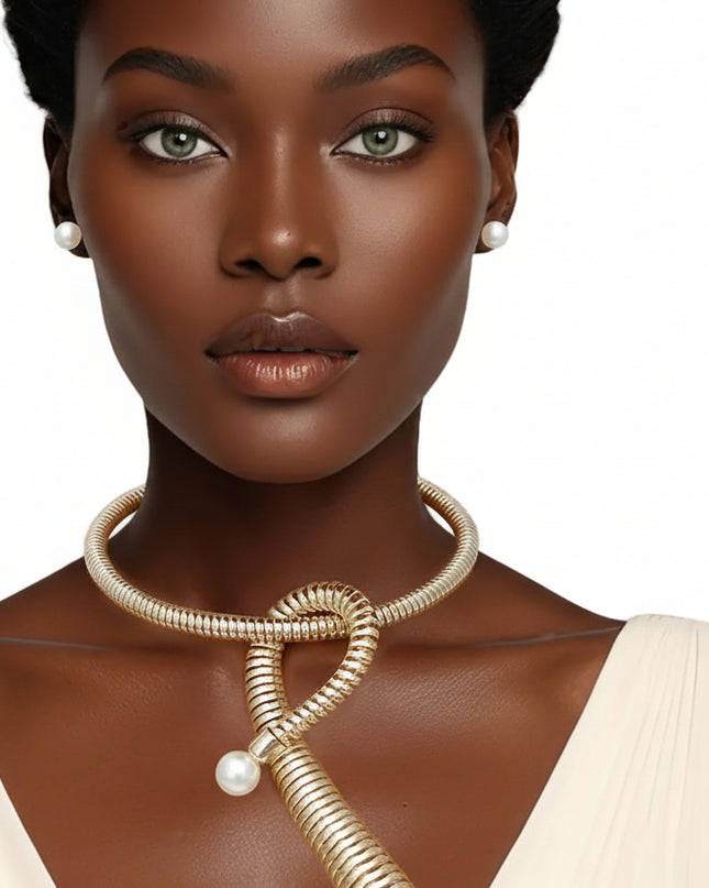 Women's Pendant Necklace Set. Handmade Fashion-Forward Gold Metal Coiled Spring Design Rigid Collar Necklace Featuring Chunky Looped Coil Pendant with Acrylic Cream Pearl Details. 