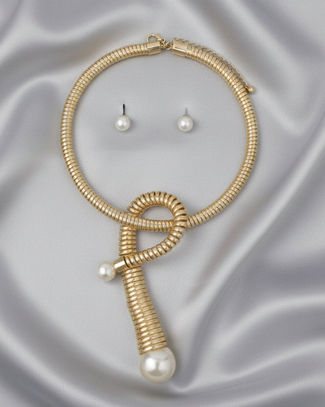 Women's Pendant Necklace Set. Handmade Fashion-Forward Gold Metal Coiled Spring Design Rigid Collar Necklace Featuring Chunky Looped Coil Pendant with Acrylic Cream Pearl Details. 