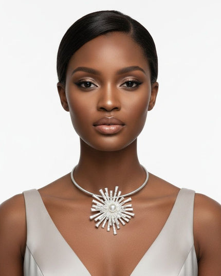 Women's Pendant Collar Necklace. Striking Rigid Matte Silver Metal Ribbed Texture Rigid Collar Necklace Featuring a Large Stacked Metal Sunburst Flower-Like Slide Pendant with Hammered Texture. Bold Sculptural Statement Piece. Pendant Measures 3.75 inches and .75 inches Tall. Lobster Clasp Closure.