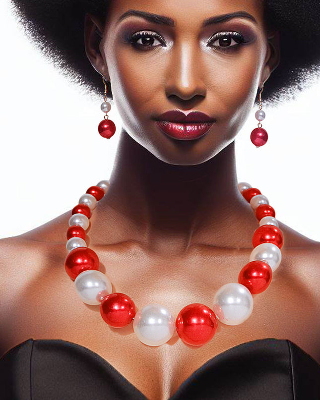 Single Strand Red and White Graduated Bubble Gum Pearl Necklace Set. Center Pearl measures 1.15 inches long.