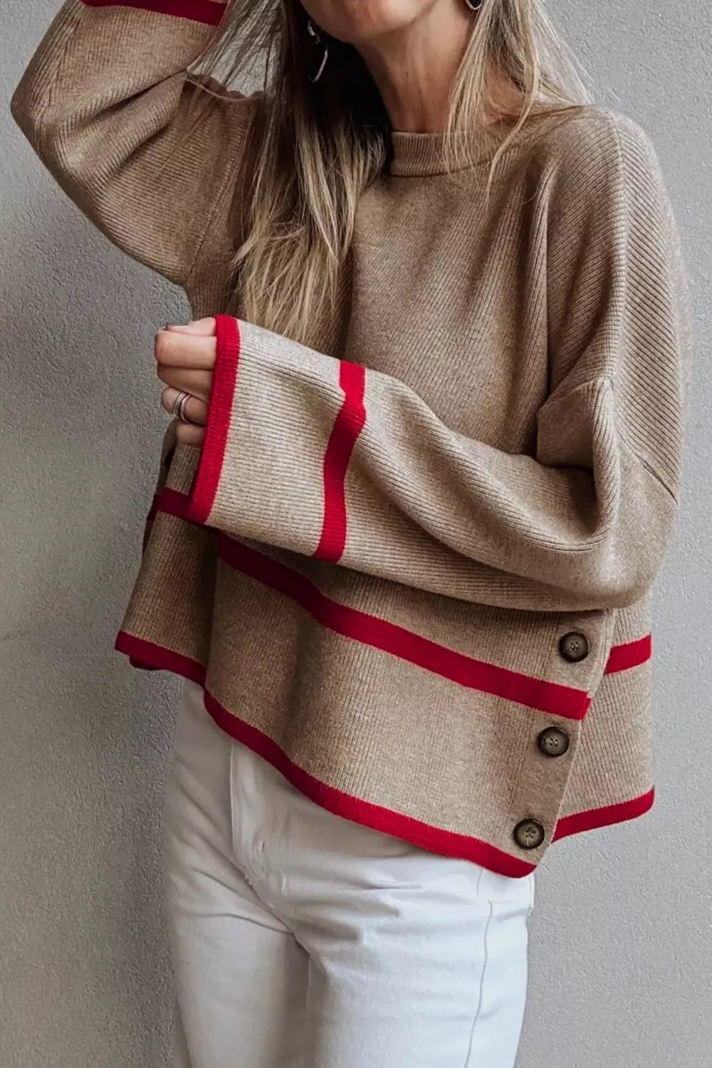 Beige sweater with red accents