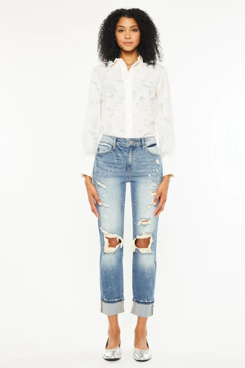 The edgy distressed details add a touch of cool and casual vibe to the classic boyfriend jeans style. 