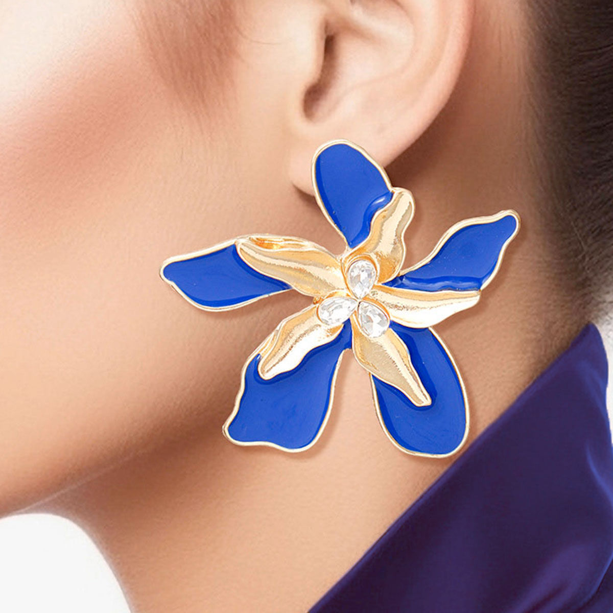 Women's Stud Earrings Textured Gold Metal with Blue Epoxy Tropical Iris Flower Earrings Featuring Rhinestone Centers. Post Backing.