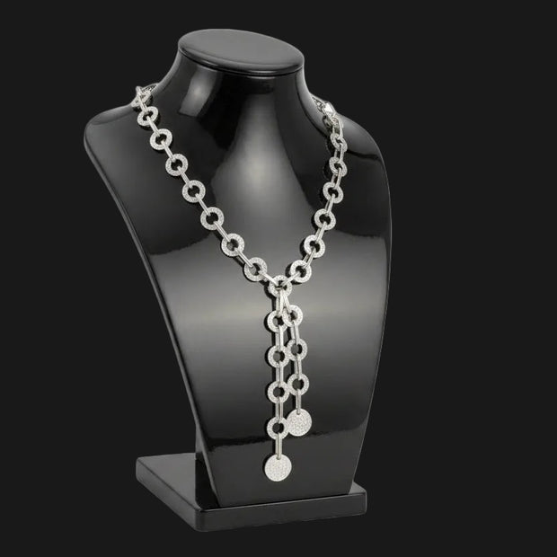 Women's Y Negligee Necklace Set. Heavy Textured Chunky Silver Metal Ring and Oval Link Chain Y Style Necklace Set Featuring Double Chain Drop measuring 9" long. Includes Matching Button-Shaped Stud Earrings.