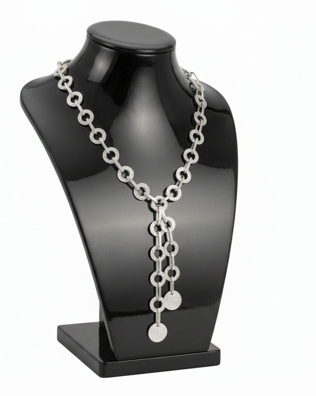 Women's Y Negligee Necklace Set. Heavy Textured Chunky Silver Metal Ring and Oval Link Chain Y Style Necklace Set Featuring Double Chain Drop measuring 9" long. Includes Matching Button-Shaped Stud Earrings.