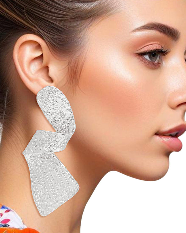 Clip On Earrings Scratch Silver 3D Twisted Design
